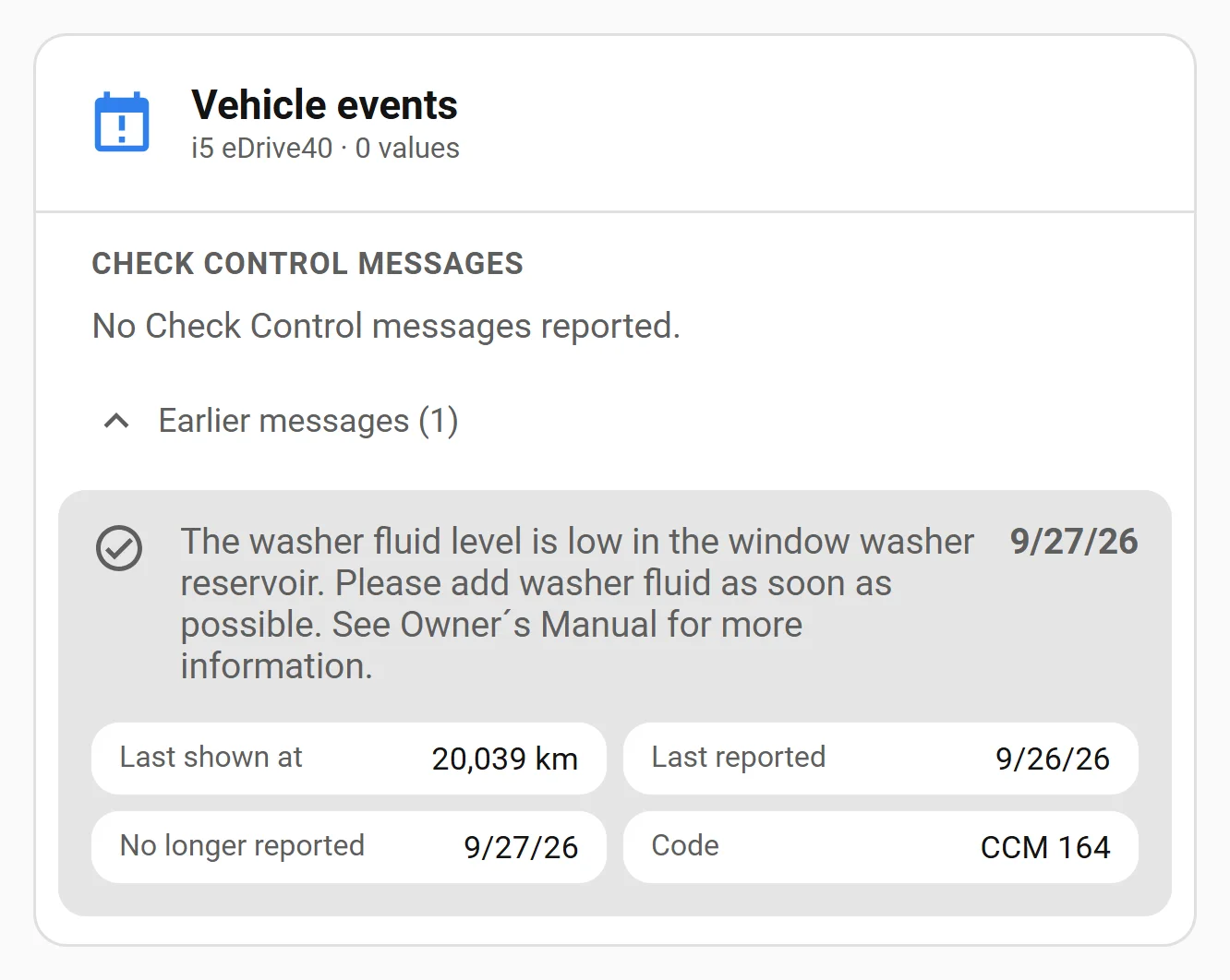 Vehicle events card with no current Check Control messages; the Earlier messages fold is open, showing the cleared low-washer-fluid message expanded with the mileage it was last shown at, the day it was last reported, the day it stopped being reported and its code